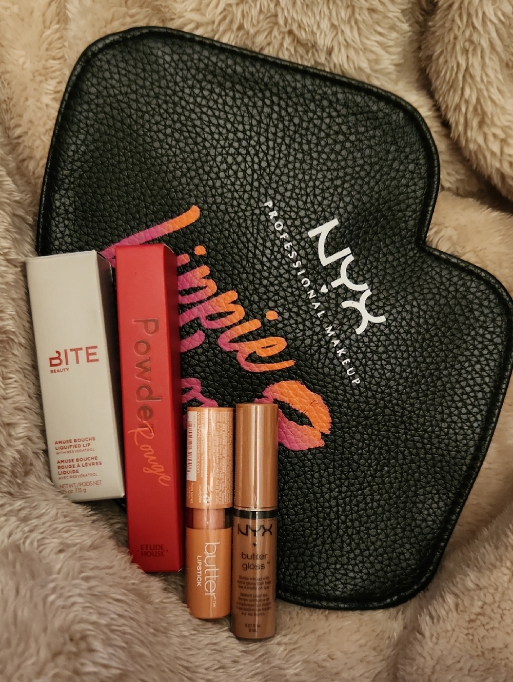 Bite NYX Butter Gloss Lip Gloss - Shimmery Bronze Nude